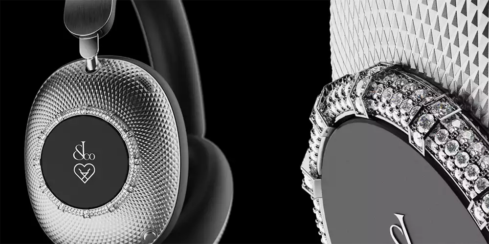 Detailed view of the Loewe x Jacob & Co Ice Diamond headphones, highlighting the intricately engraved surface and diamond-encrusted 14K white gold ring