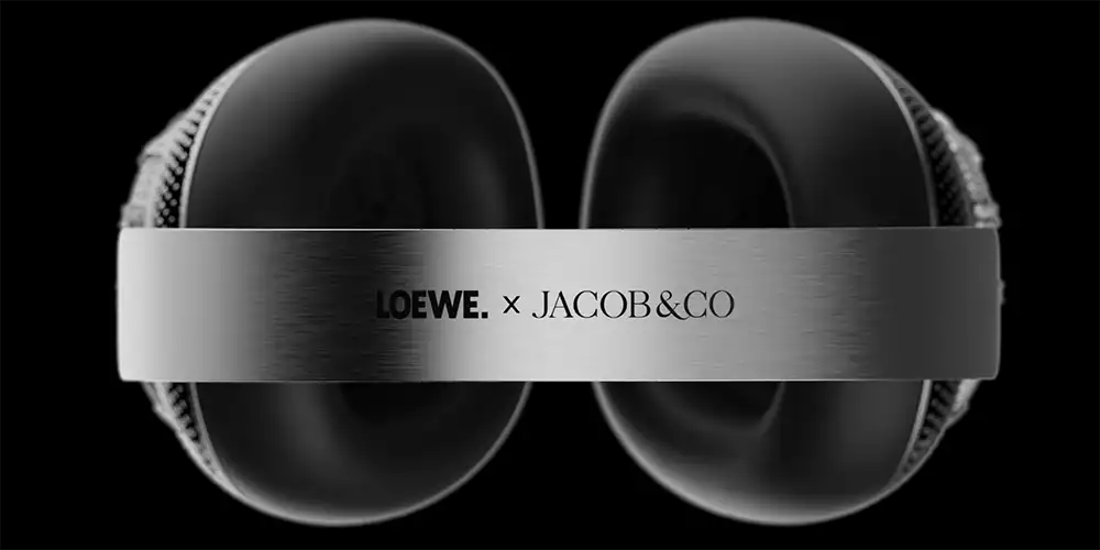 The official collaboration branding "LOEWE. x JACOB&CO" engraved on the metal headband