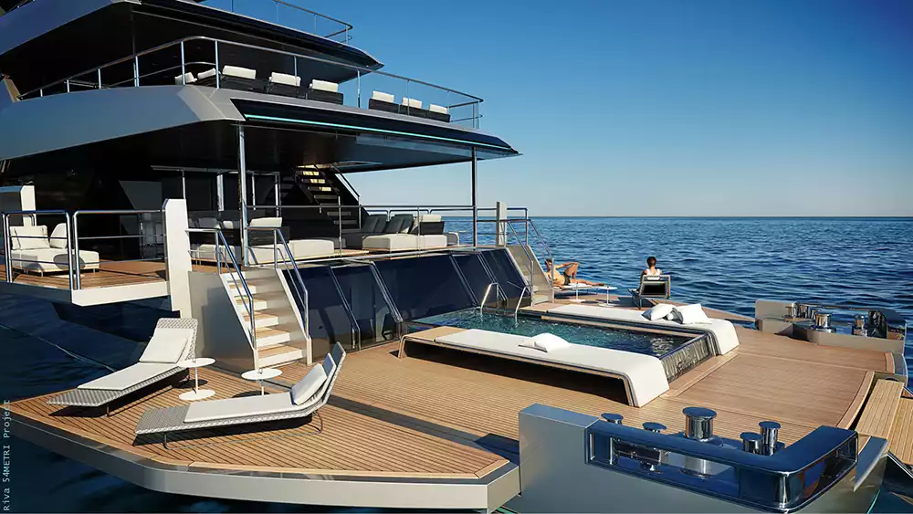 The spacious aft beach club of the Riva 54 Metri, featuring a glass-fronted pool and teak decking leading to the water