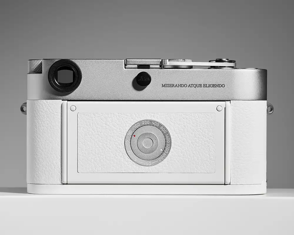 Close-up of the back of Pope Francis's Leica M-A showing the engraved motto 'Miserando atque eligendo