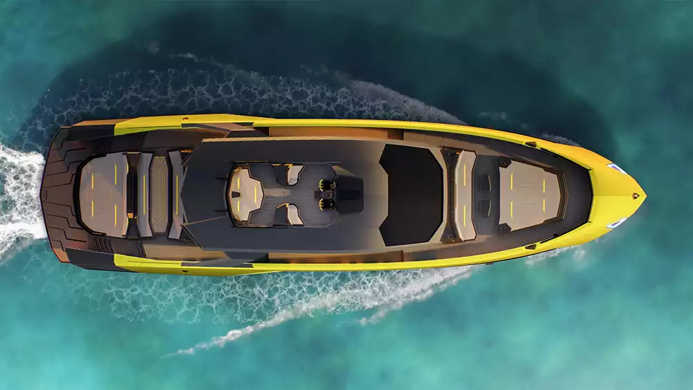 Overhead view of the Tecnomar for Lamborghini 101FT yacht on turquoise water, showing its sleek deck layout
