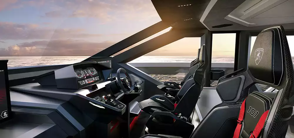 The high-tech cockpit of the Tecnomar for Lamborghini 101FT, featuring carbon fiber racing seats and a digital dashboard