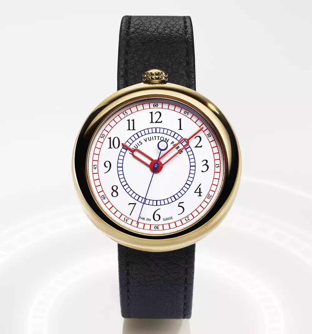 Detailed macro shot of the Louis Vuitton Monterey Grand Feu enamel dial with red and blue indicators