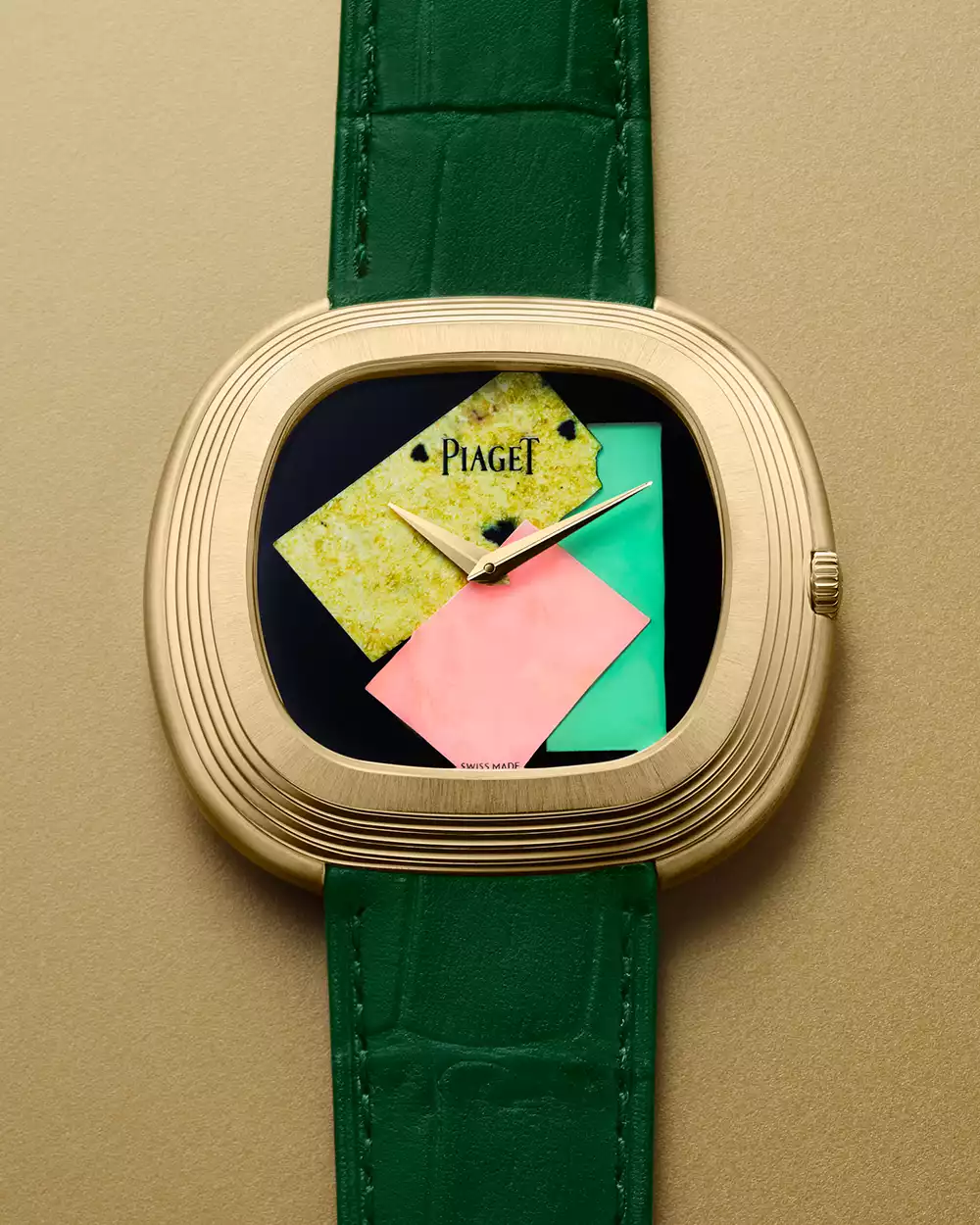 The Piaget Andy Warhol Watch Collage showing the 18k yellow gold stepped case and green alligator leather strap