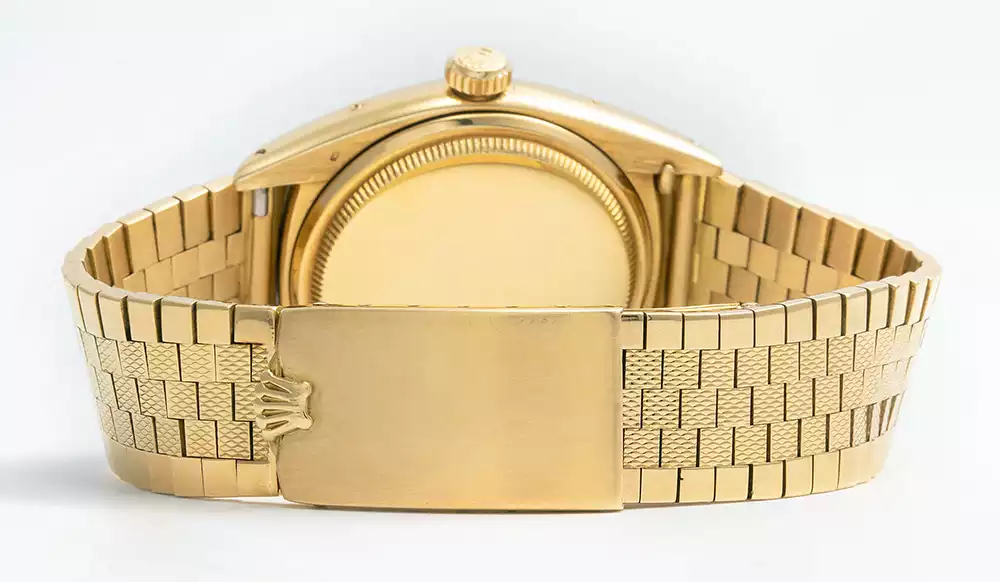 Caseback and intricate yellow-gold tile bracelet of the Rolex 6062 that sold for $6.2 million