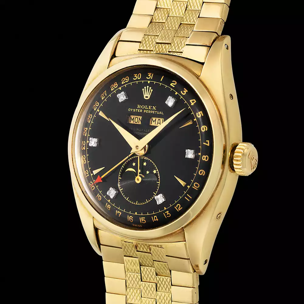 Detailed view of the black 'stelline' dial, moonphase, and diamond indices on the record-breaking Rolex Ref. 6062