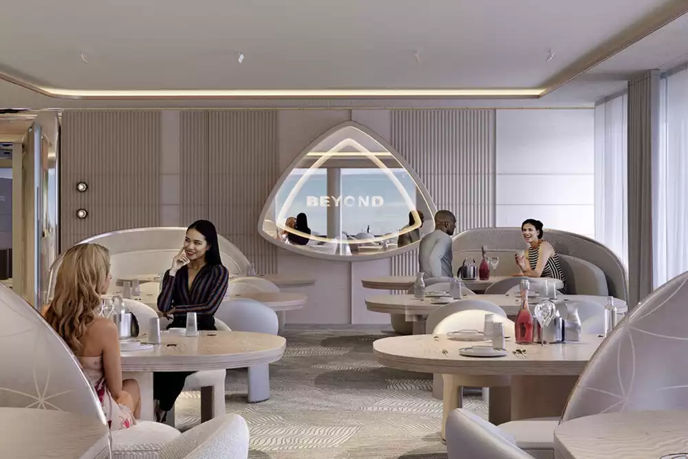 Luxurious interior lounge of the Maybach Ocean Club yacht featuring futuristic, elegant design