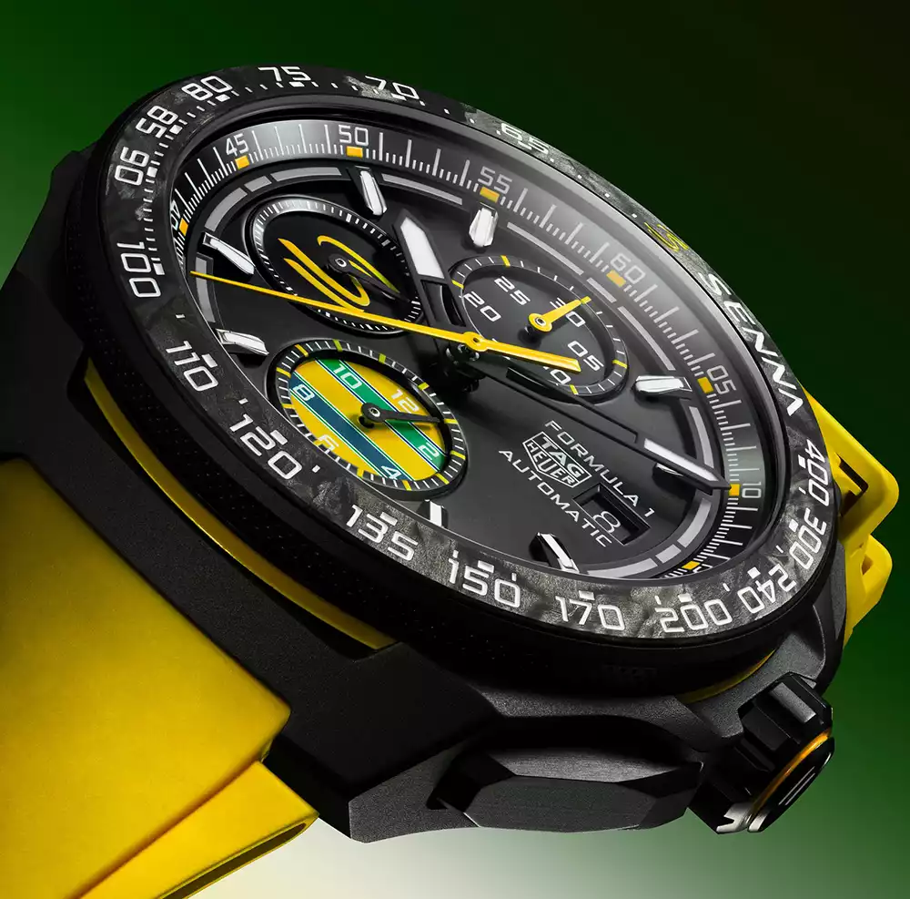 Side profile of the TAG Heuer Senna chronograph case, showing the black DLC-coated crown and pushers