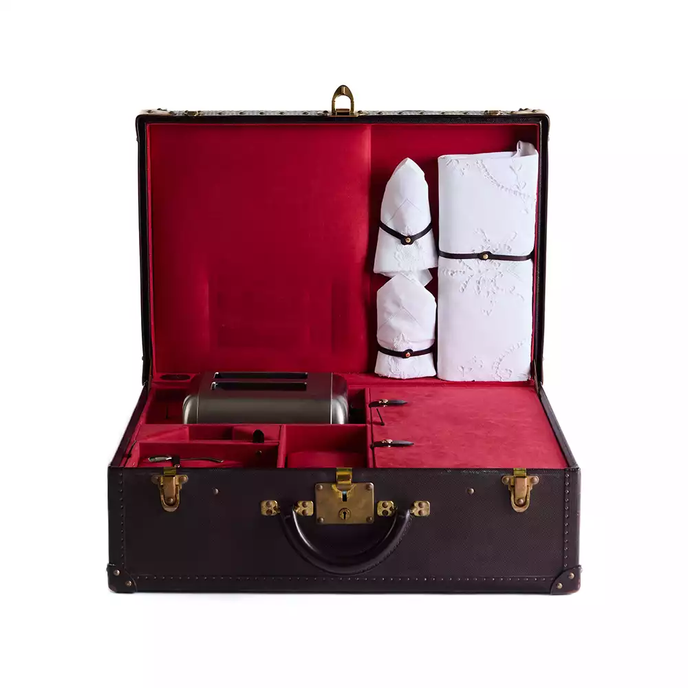 Detailed view of the bespoke Louis Vuitton Breakfast Cabine's red velvet interior