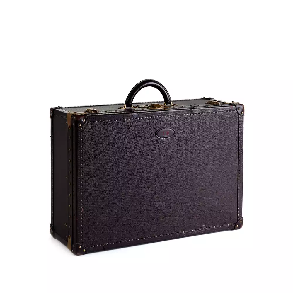 Integrated silver toaster within the custom-fitted red velvet interior of Karl Lagerfeld's Louis Vuitton Breakfast Cabine