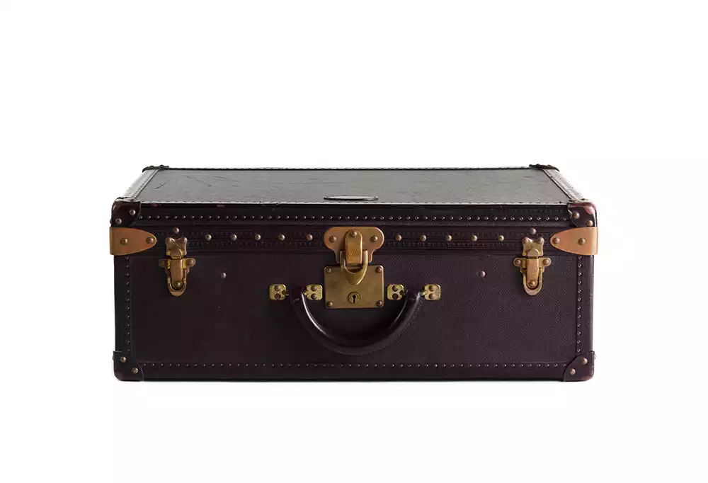 The custom Louis Vuitton Breakfast Cabine for Karl Lagerfeld, presented as a classic closed dark brown travel trunk with brass hardware