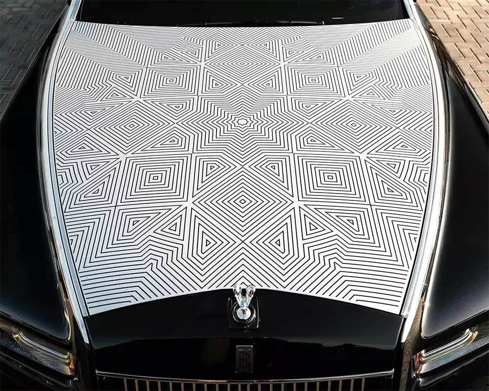 Detailed top-down view of the patented laser-etched geometric pattern on the Phantom Arabesque bonnet
