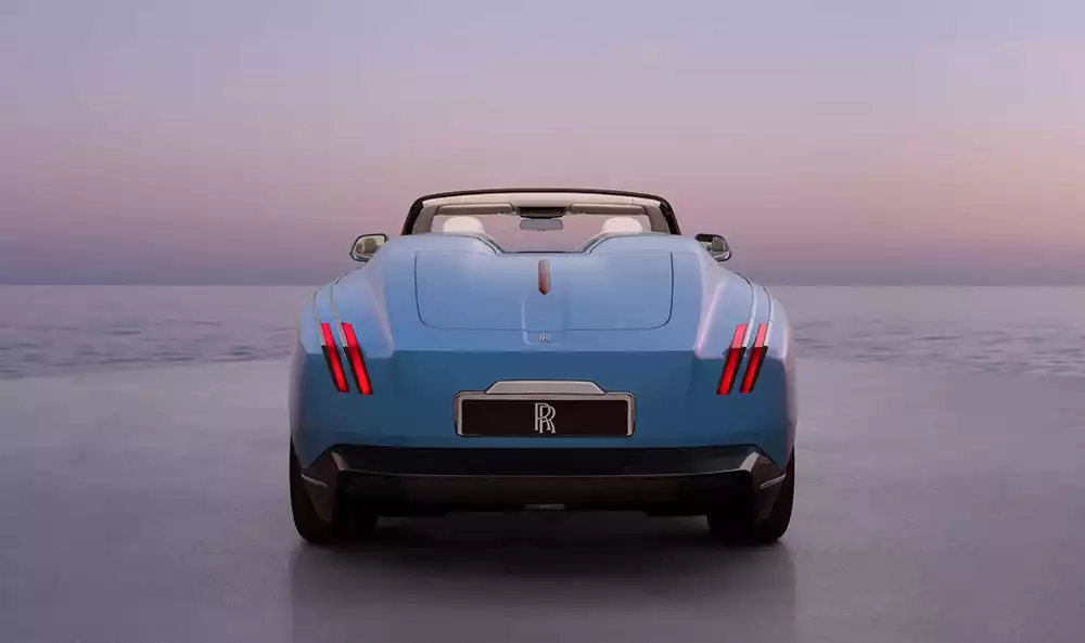 Rear view of the Rolls-Royce Project Nightingale electric vehicle highlighting its striking vertical taillights