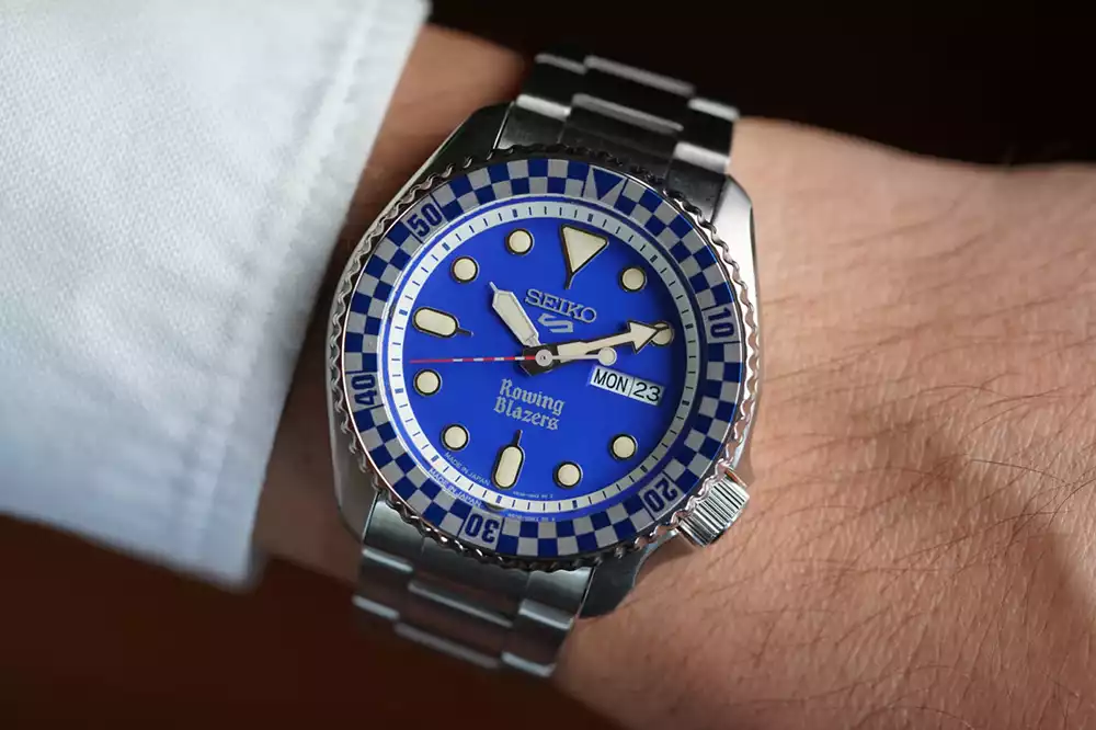 Close-up of Seiko x Rowing Blazers SRPM19 blue dial watch on steel bracelet