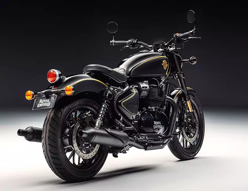Rear profile of the custom Royal Enfield Shotgun 650 Rough Crafts Edition showing the exhaust and tail