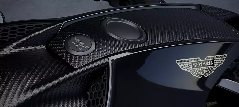 Carbon fiber details and Aston Martin branding on the AMB 002